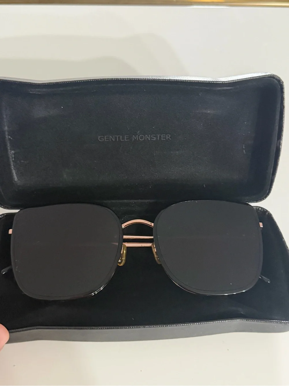 GENTLE MONSTER Black Sunglasses with Rose Gold Bridge